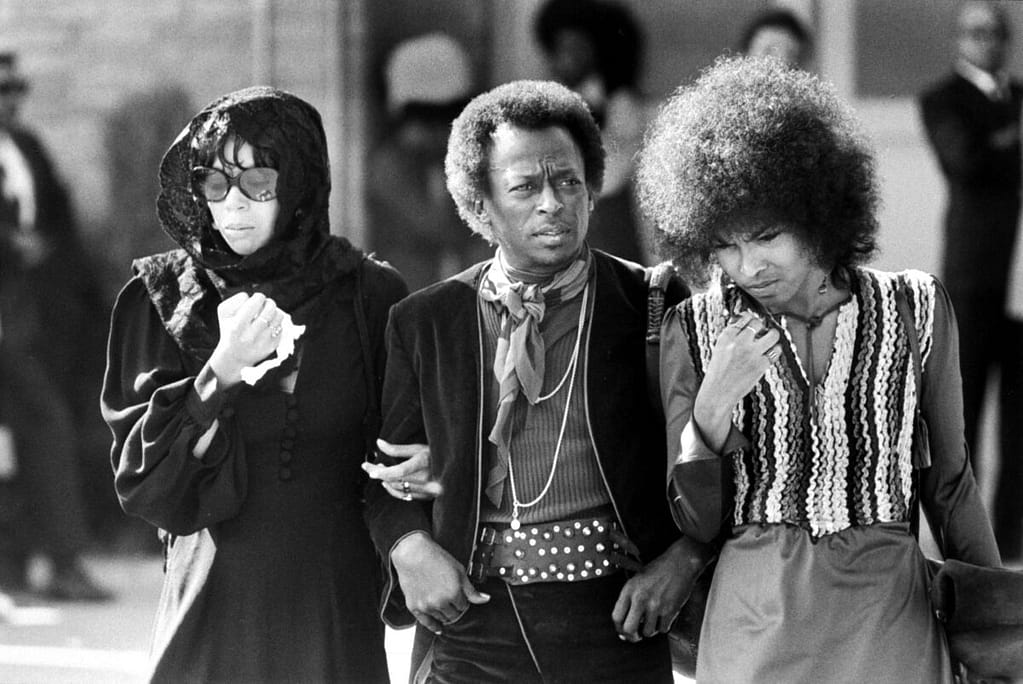 Miles Davis with Betty davis at Jimi Hendrix funeral. Miles Davis Electric era was greatly influenced by Hendrix.