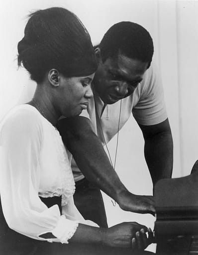 Alice Coltrane and her husband John at the piano